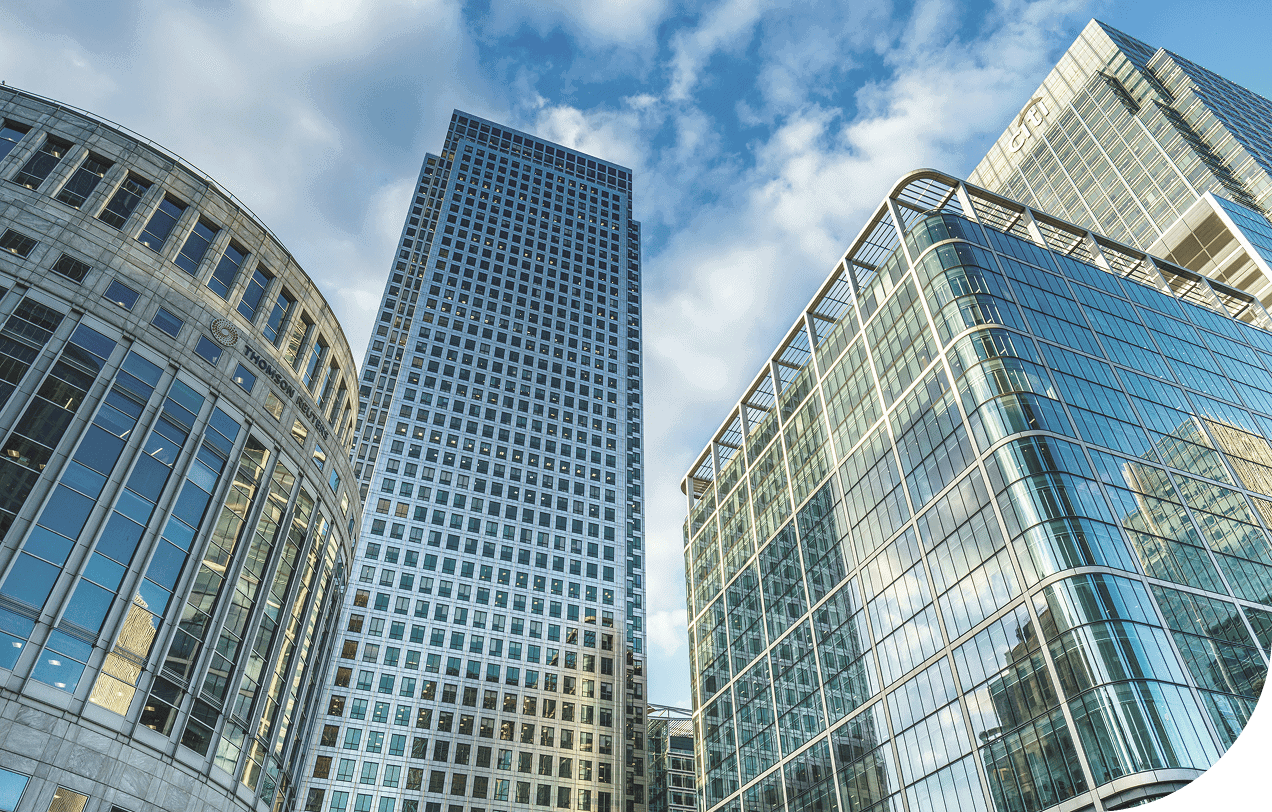 Modern glass skyscrapers and office buildings in a business district, showcasing corporate architecture and urban development.